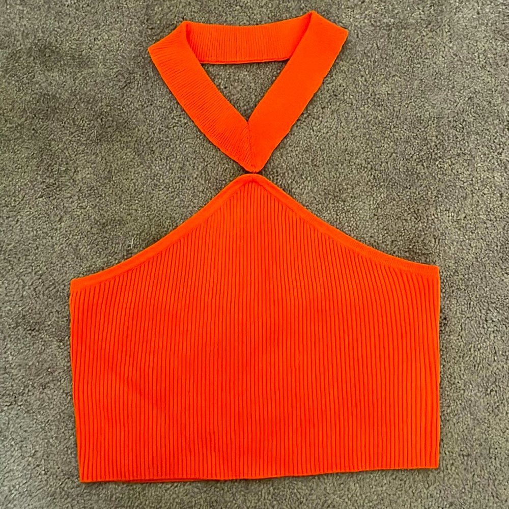 Knit halter top. Wraps around neck. Size S.